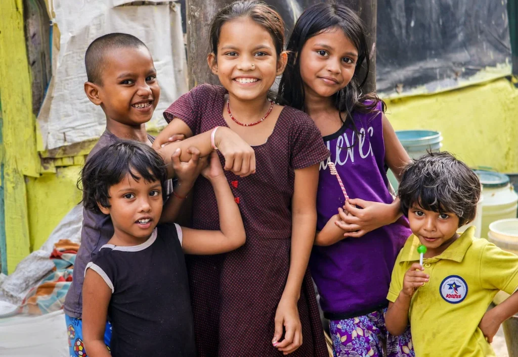 Smiling children supported by a community foundation